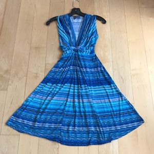 Striking blue dress with deep v neck and tie